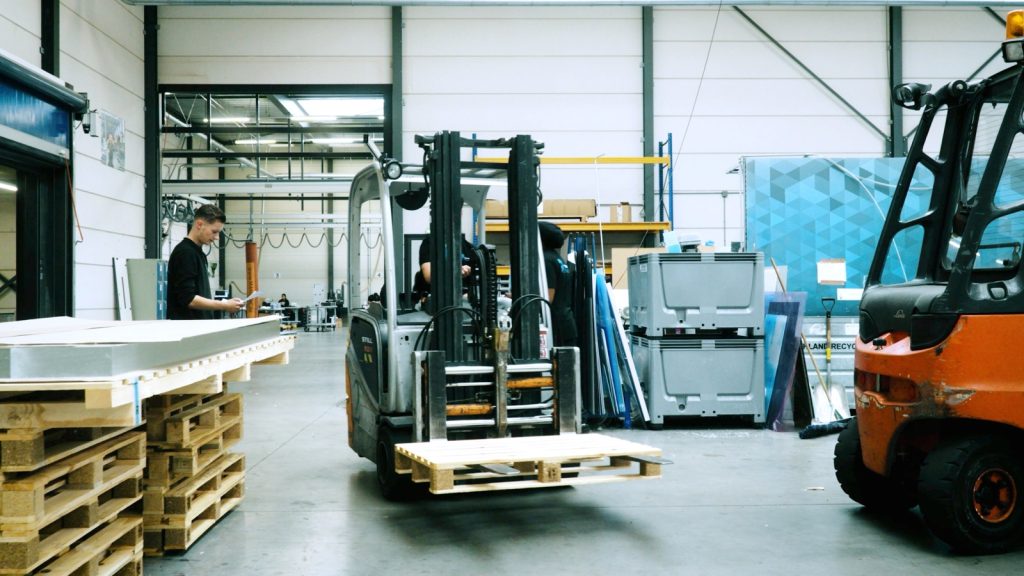 Forklift truck in the automated sheet metal warehouse